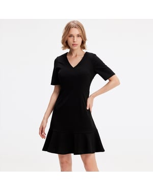 Minimalistische trapeze jerseyjurk