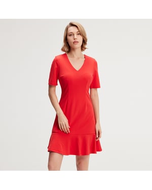 Minimalistische trapeze jerseyjurk