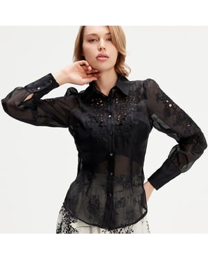 Geborduurde organza blouse