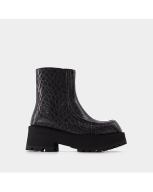 Booties med dragkedja i svart läder