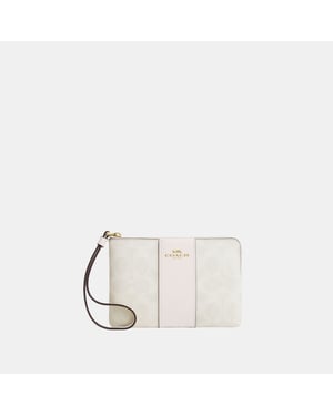 Corner Zip in Signature Canvas with Leather Stripe Bag