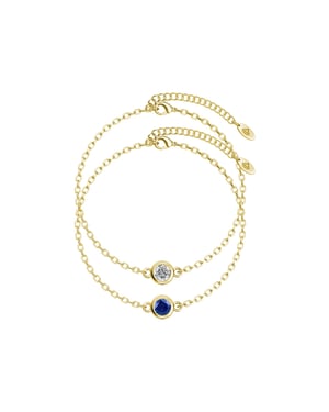 Geboortesteen armbanden - Goud, kristal en blauw