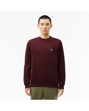 Men's Lacoste Fleece Crewneck Sweatshirt in red maroon
