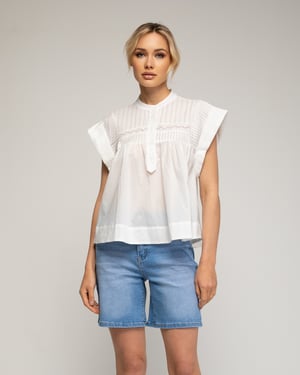 Oversized mouwloze top met plooien