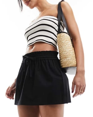 ASOS DESIGN linen look tie waist mini skirt in black