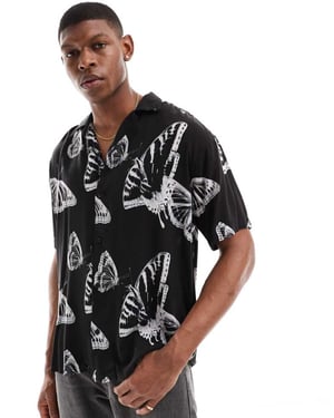 Jack & Jones oversized revere collar butterrfly shirt in black-White