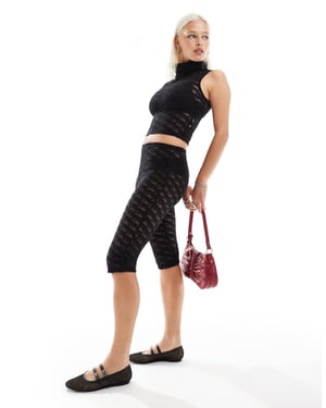 Labelrail x Daisy Birchall bow lace peddle pusher leggings in black