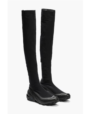 SALOMON X MM6 CROSSWADER sockstövlar med nitar och sole i svart