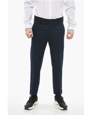 Slim fit TOM-byxor med kontrasterande kanter och knappar vid ankeln i blått