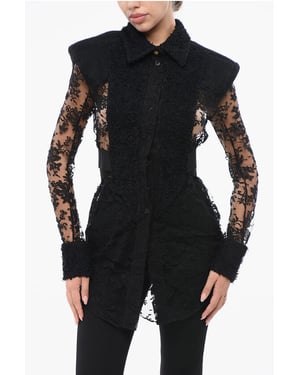 Spetsskjorta med vadderade axlar i svart