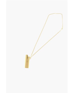 Halsband med metalldekoration och tändarfodral i guld