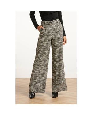 Smashed Lemon Losvallende zwart wit broek met wijde pijpen en tweedlook stof |