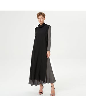 Lichte asymmetrische poncho