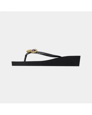 Uzurii T mid heel switch black