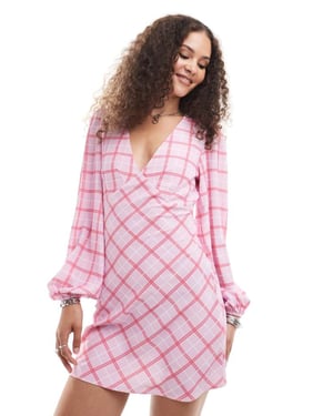 Glamorous v neck long sleeve flippy mini dress in pink check