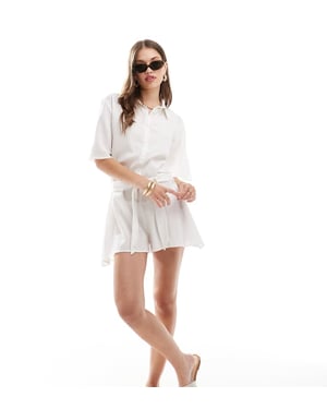 Esmee beach belted playsuit in white