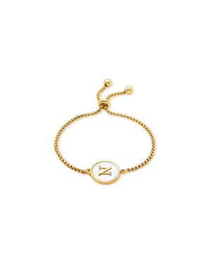 Luxenter armband i vit pärlemor avslutat i 18K gult guld - Alfabet
