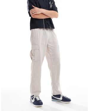 Jack & Jones – Beige avsmalnande linnebyxor med cargofickor