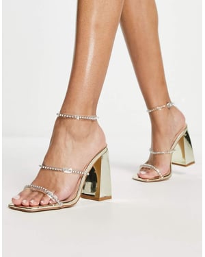 Simmi London – Inez – Guldfärgade sandaler med blockklack och utsmyckning