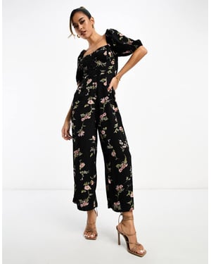 ASOS DESIGN – Blommig jumpsuit med mjölkpigor