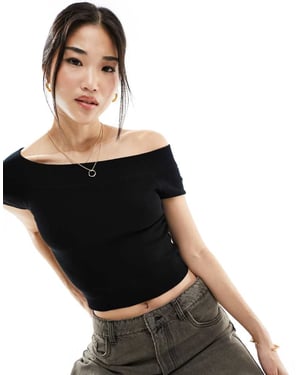 Ribbad crop top med off shoulder-motiv, svart
