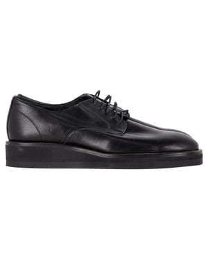 Yohji Yamamoto Veterschoenen in Zwart Leer