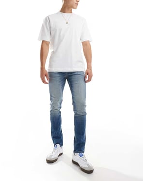 ASOS DESIGN – Mörkblå skinny jeans i vintage-modell