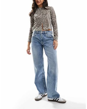 ASOS DESIGN – Mellantvättade baggy jeans
