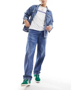 ASOS DESIGN – Mörkblå tvättade baggy jeans