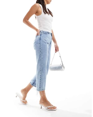 In The Style – Ljusblå jeans med diamanter och fransar