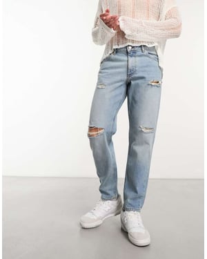 ASOS DESIGN – Mellanblå klassiska, styva jeans med revor