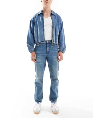 ASOS DESIGN – Blå jeans med avsmalnande passform