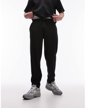 Topman – Svarta avsmalnande plisserade byxor