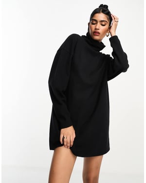 ASOS DESIGN – Svart miniklänning med polokrage och mjuk, volanger