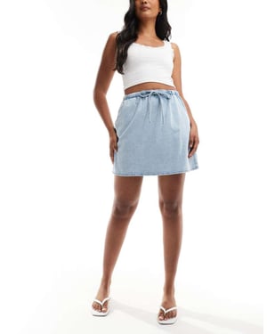 ASOS DESIGN soft denim pull on mini skirt in light wash