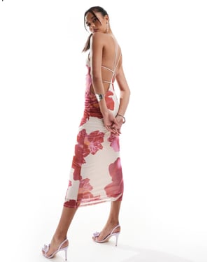 ASOS DESIGN – Rosa blommig midiklänning med halterneck och extremt utskuren detalj baktill