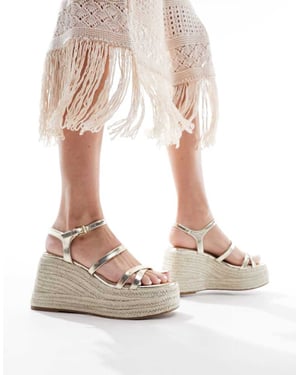 schuh – Exclusive Vienna – Guldfärgade espadriller med kilklack och band