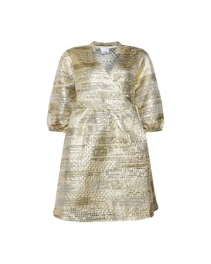 Jannie Aya-jurk in goud
