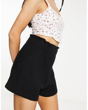 Monki – Svarta shorts med hög midja och pull-on-shorts