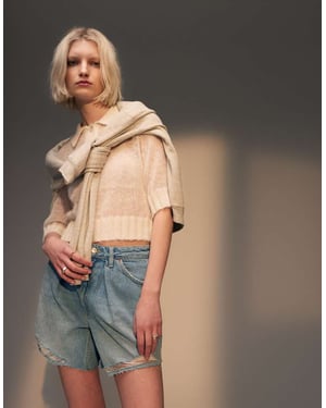 Topshop – Plisserade jeansshorts i blekt färg