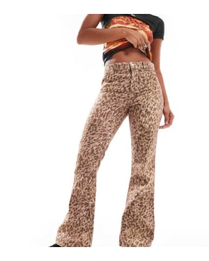 Reclaimed Vintage västern jeans med leopardmönster