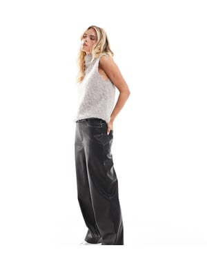 ASOS DESIGN Petite faux leather straight leg trousers in washed black
