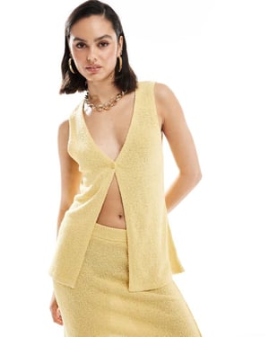 ASOS DESIGN knitted longline waistcoat in textured yarn co-ord in lemon