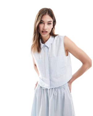 ASOS DESIGN sleeveless cropped shirt in blue and white stripe