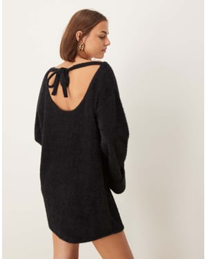 ASOS DESIGN supersoft fluffy slouchy mini jumper dress in black