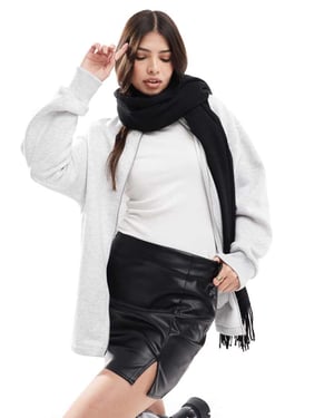 ASOS DESIGN split front leather look mini skirt in black