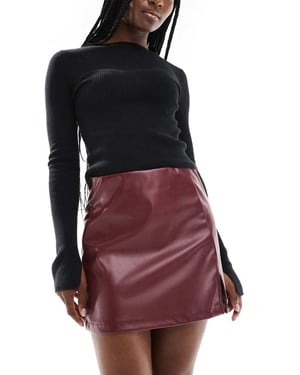 ASOS DESIGN PU mini skirt with split in burgundy