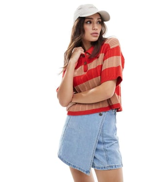 ASOS DESIGN stickad polo topp i ribb i ränder i orange och röd