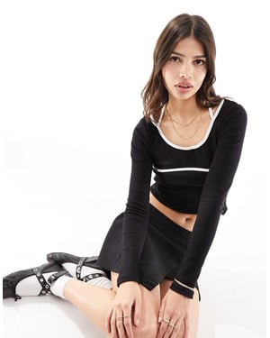 Vero Moda randig jersey-top med kontrasterande piping i svart