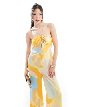 ASOS DESIGN halterneck knyt framtill rynkad straight leg saten jumpsuit i abstrakt mönster